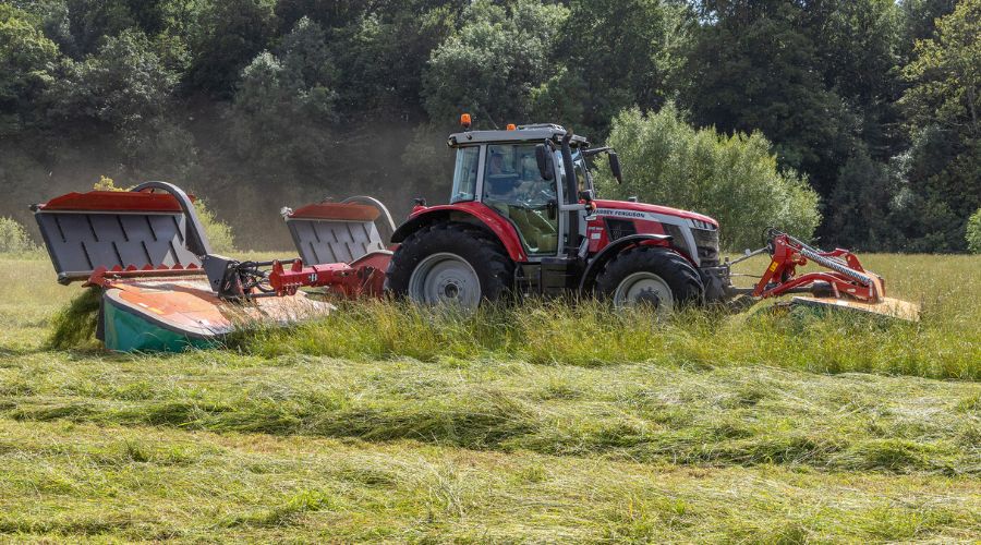 Kverneland butterfly mower in grass field