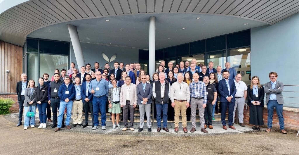 group of people standing outside Rothamsted Research during the Global Mancozeb Summit