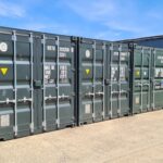 Container people article with storage containers on farm