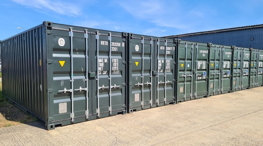 Container people article with storage containers on farm